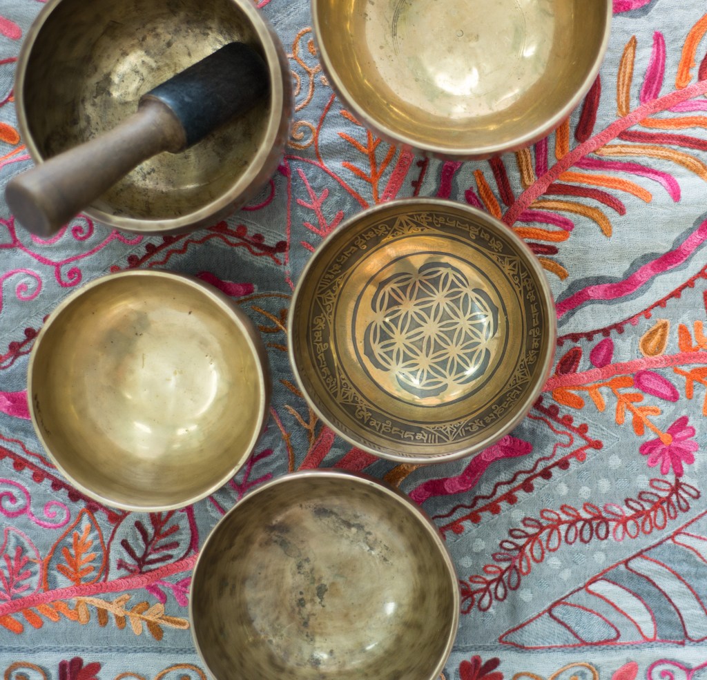image of Himalayan singing bowls on the floor